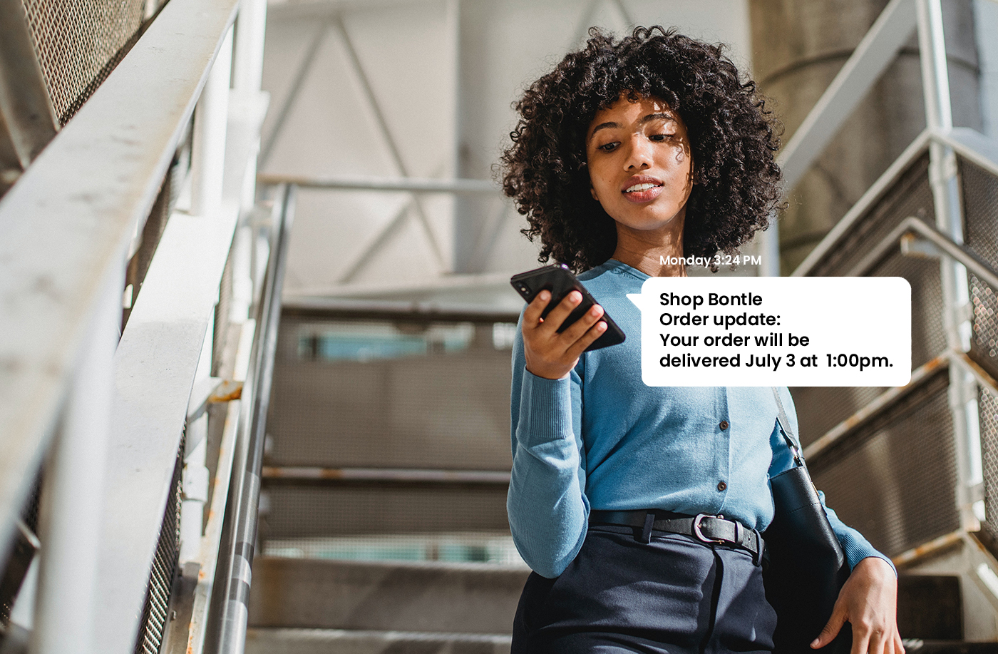 Young lady recieving a SMS message